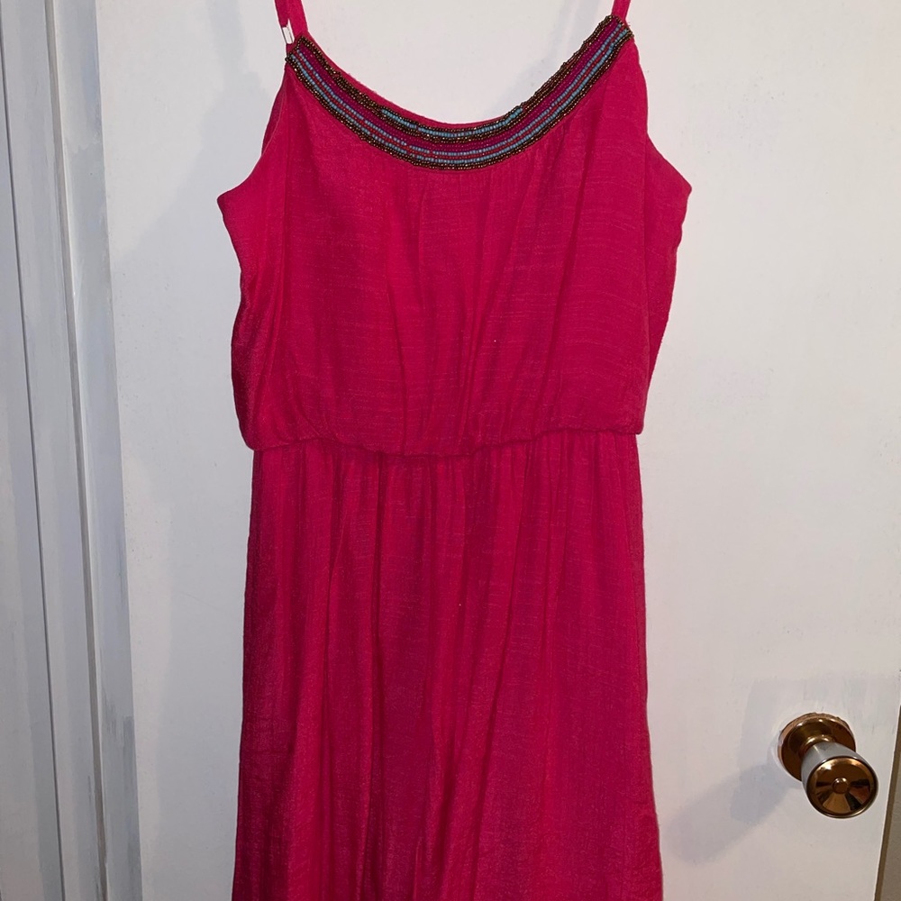 pink sleeveless dress with beaded detail